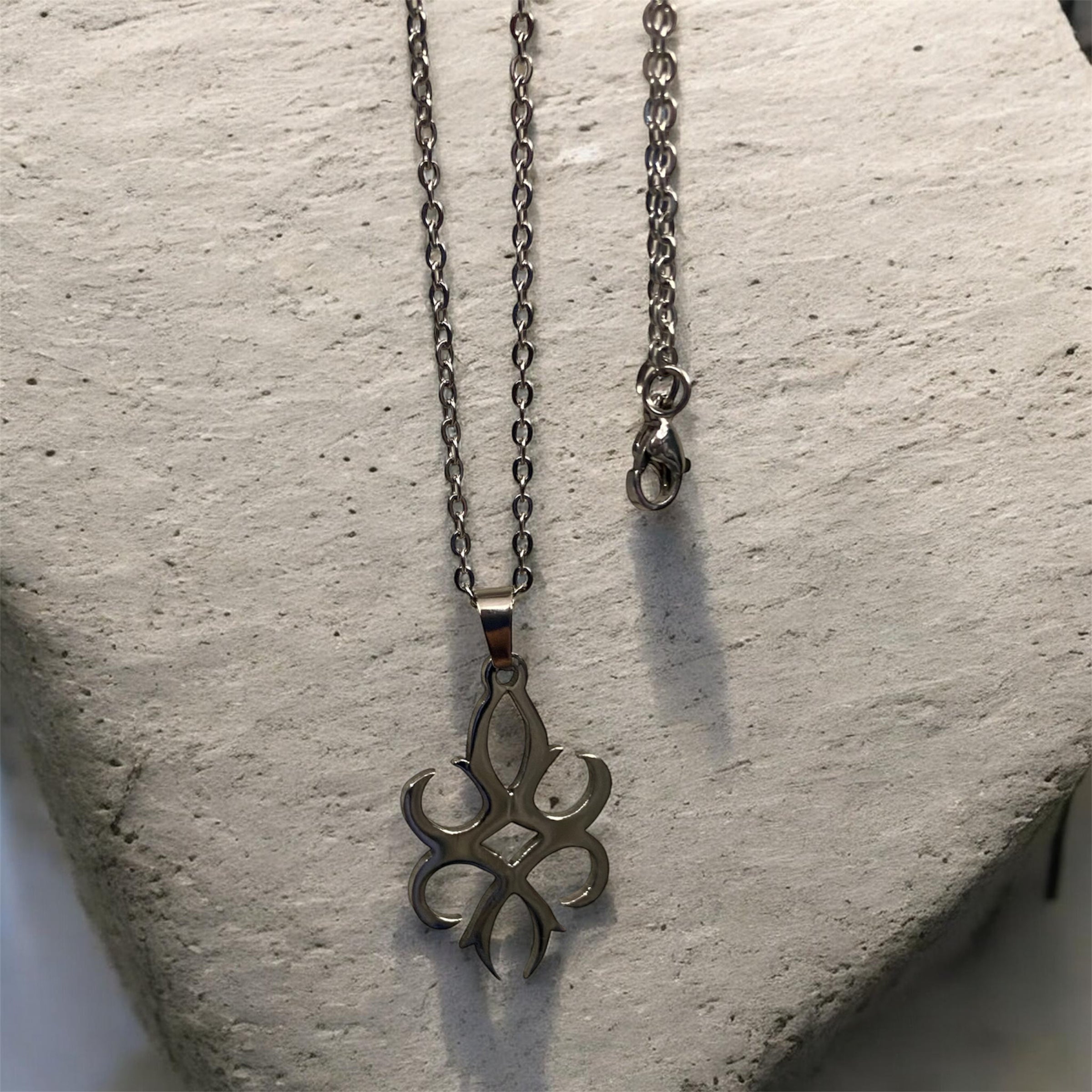 Stainless Steel Tribal Symbol Pendant Necklace (Buy 2 get 1 free)